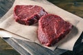 Succulent tender raw lean beef steaks lying