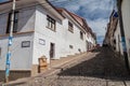 SUCRE, BOLIVIA - APRIL 21, 2015: Steep cobbled street in Sucre, Boliv