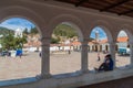 SUCRE, BOLIVIA - APRIL 22, 2015: White colonial houses and an archway on Plaza Anzures square in Sucre, capital of