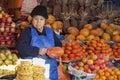 SUCRE, BOLIVIA - AUGUST 07, 2017: Unidentified bolivian sellers at Fruit Stalls at Central Market in Sucre