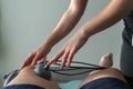 Suction cups applied to a knee in physiotherapy