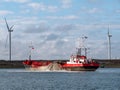 Suction dredger ship dredging in harbour, IJmuiden, Netherlands Royalty Free Stock Photo