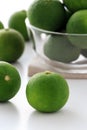 Sudachi; green small Japanese citrus in a bowl Royalty Free Stock Photo