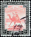 SUDAN - CIRCA 1921: A stamp printed in Sudan shows Arab Postman on camel, circa 1921.