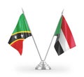 Sudan and Saint Kitts and Nevis table flags isolated on white 3D rendering