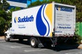 Suddath Relocation Systems truck waits for customer on outdoor parking lot. Suddath is a global moving company - Foster City,