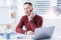 Unhappy man feeling terrible toothache while working in his office Royalty Free Stock Photo