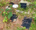 Sudetenland. Broken inscriptions of black glass tombstones
