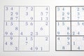 Sudoku puzzle grids as background, top view