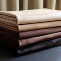 Suede Plain Sheet - Stacked Bed Sheet Pile In Satin Beige And Dark Taupe