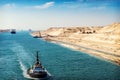 The Suez Canal - a ship convoy passes through the new eastern ex