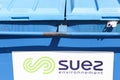 Suez environnement logo on a dumpster