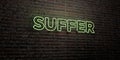 SUFFER -Realistic Neon Sign on Brick Wall background - 3D rendered royalty free stock image