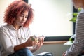 Woman suffering from depression holding packs of antidepressants