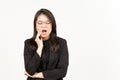 Suffering Toothache Of Beautiful Asian Woman Wearing Black Blazer Isolated On White Background Royalty Free Stock Photo