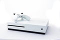 Suffolk, UK June 01 2020: A Microsoft Xbox One S gaming console with a wireless controller shot against a plain white background Royalty Free Stock Photo