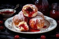 sufganiyot donuts filled with red jelly on a plate Royalty Free Stock Photo