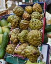 Sugar apple on the counter of the authentic Egyptian market. Fresh fruits in the street bazaar