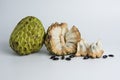 Ripe sugar apple ( srikaya ) ready to eat and black seed granules isolated on white background