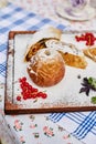 Sugar baked apple on a board sprinkled with powdered sugar Royalty Free Stock Photo