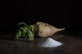 Sugar beet and white sugar with rust background Royalty Free Stock Photo