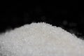 Sugar on a black background Royalty Free Stock Photo