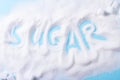 Sugar on blue background