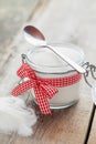 Sugar bowl with spoon on table