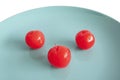 Sugar coated red cherries are used to decorate desserts in blue plate. Royalty Free Stock Photo