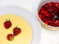 with sugar-coated strawberries with vanilla pudding