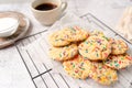 Sugar cookies with sprinkles, colorful coffee treat. Royalty Free Stock Photo