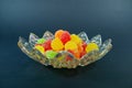 Gummies candy plate a black background Royalty Free Stock Photo