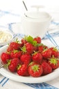 Sugar cream and strawberries Royalty Free Stock Photo