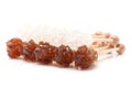 Sugar crystal on wooden stick isolated on white background. Royalty Free Stock Photo