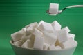 Sugar cube on a spoon Royalty Free Stock Photo