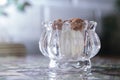 Glass bowl filled with sugar cubes . sugar cubes in bowl isolated on white background Royalty Free Stock Photo