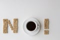 Sugar cubes and cup of coffee arranged as word NO on white background. Diet unhealty sweet addiction concept Royalty Free Stock Photo