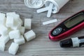 Sugar cubes on the table. Diabetes testing Royalty Free Stock Photo