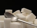Sugar cubes and tea-spoon Royalty Free Stock Photo