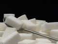 Sugar cubes and tea-spoon Royalty Free Stock Photo