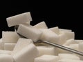 Sugar cubes and tea-spoon Royalty Free Stock Photo