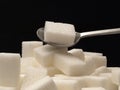 Sugar cubes and tea-spoon Royalty Free Stock Photo