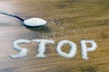 Sugar inscription stop  spoon ful of sugar Royalty Free Stock Photo