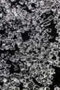 Sugar micro crystals shooted on a black - macro