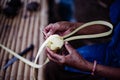 Sugar palm farmers weave palm leaves Make a traditional children's toy. in Phetchaburi Province