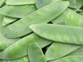 sugar pea pods, Pisum sativum, background, top view of green sugar snaps Royalty Free Stock Photo
