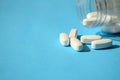 Sugar pills, artificial sweeteners. Close up white pills with a bottle Royalty Free Stock Photo