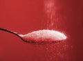 Sugar pouring spoon Royalty Free Stock Photo