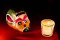 Sugar skull and candles - Calaverita - Ofrenda Dia de muertos Royalty Free Stock Photo