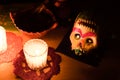 Sugar skull and candles - Calaverita - Ofrenda Dia de muertos Royalty Free Stock Photo